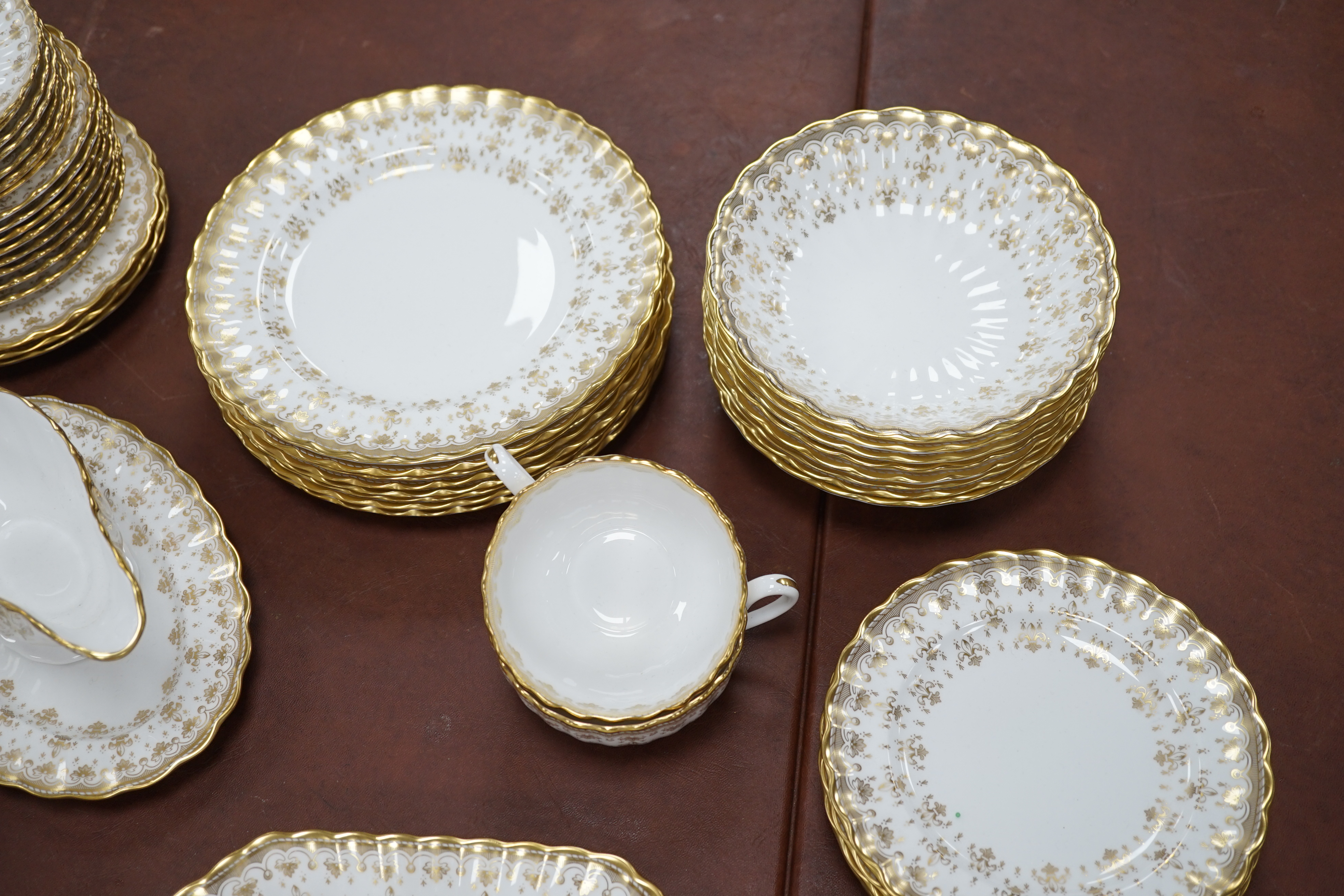 A Spode ‘Fleur de Lys’ dinner, tea and coffee set, settings for eight